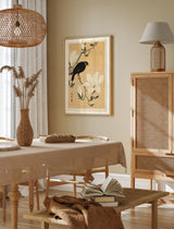 Myna bird on magnolia branch